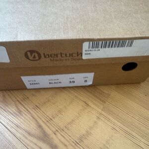 Brand new in box bertuchi black suede boots. Made in Spain